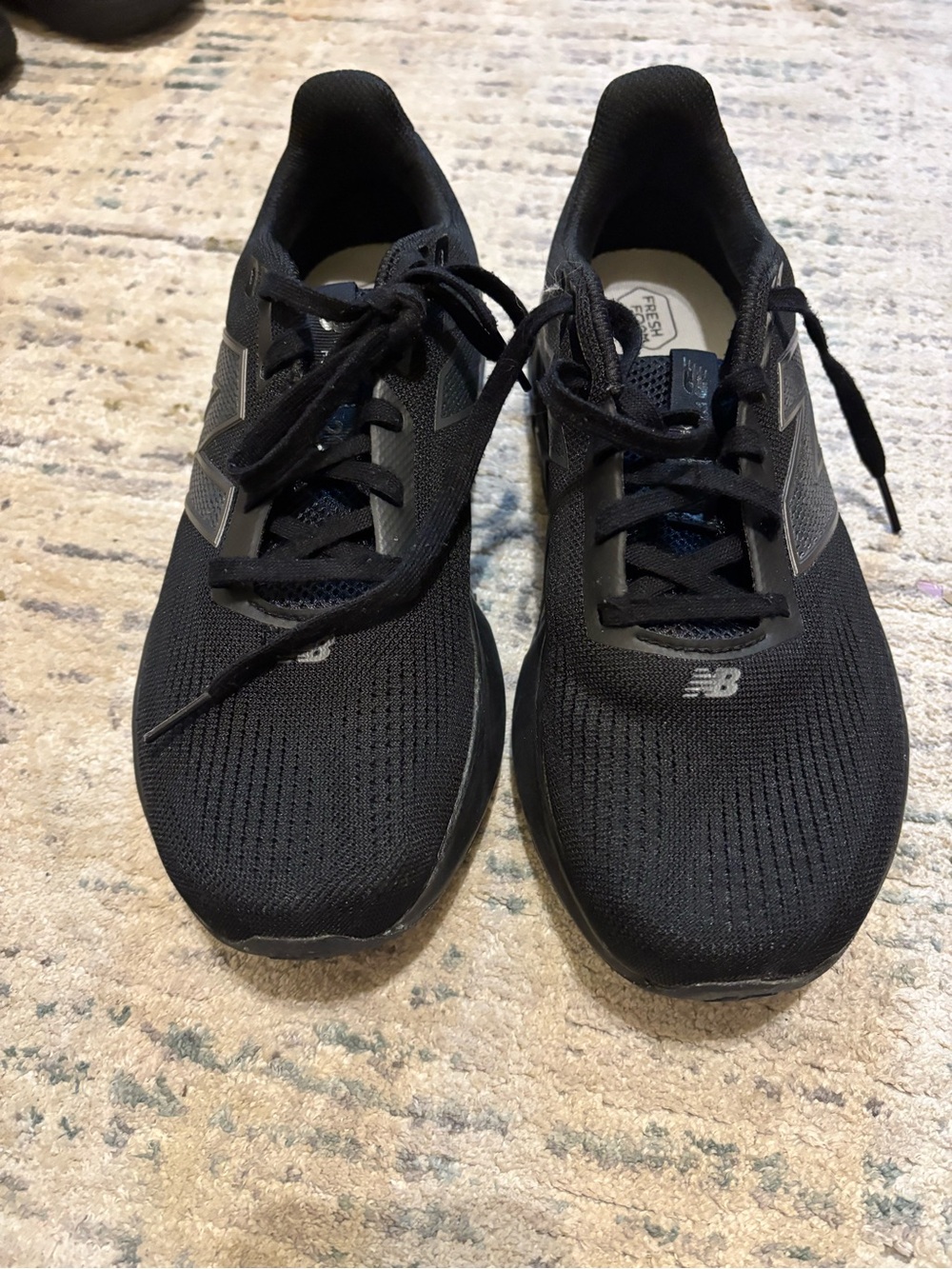 New Balance Men's Black Athletic Running Shoes with Gray Accents